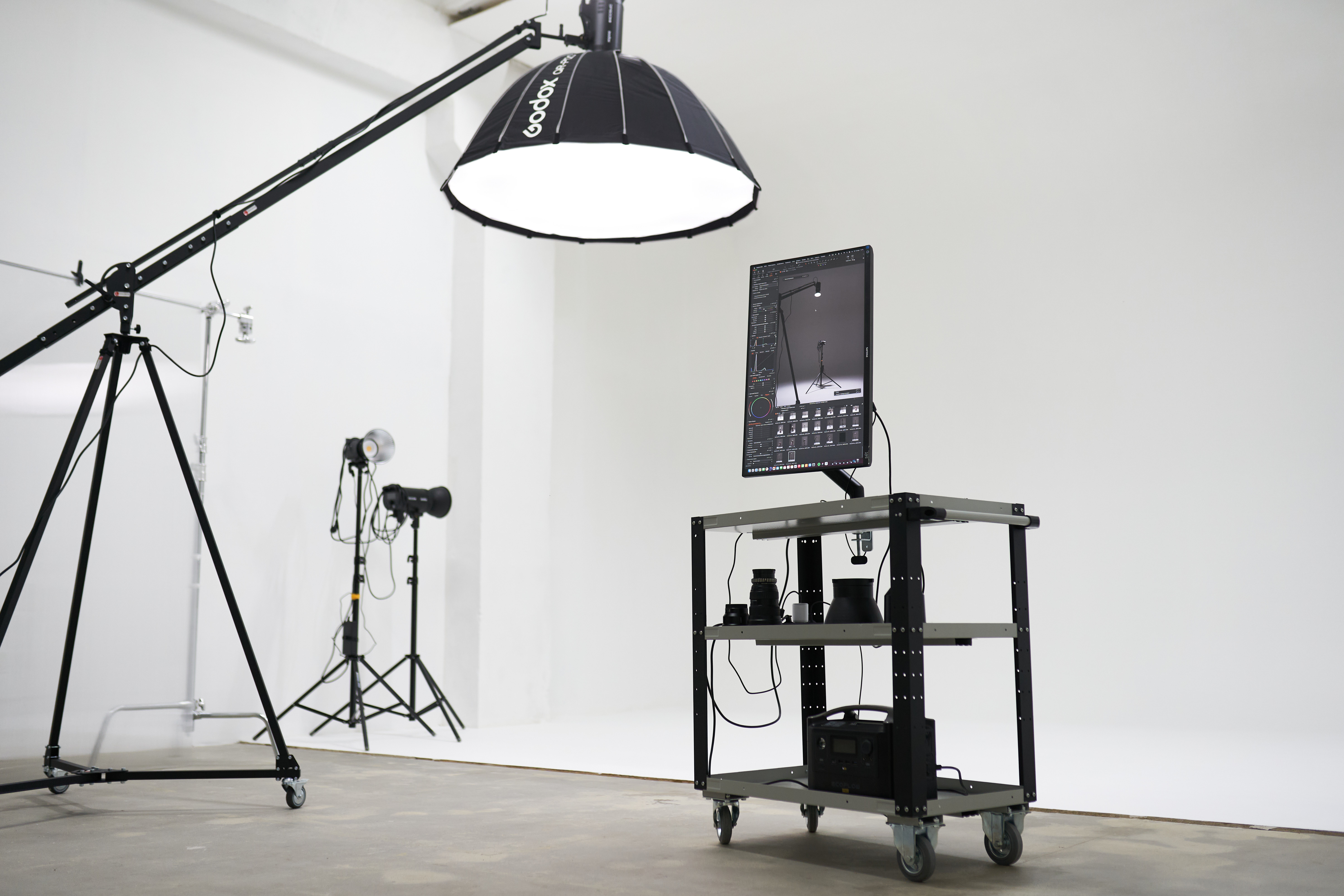 Photographer creating a polished professional headshot in a studio